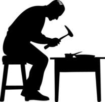 Craftsman Silhouette Concentrating on Metalworking with Hammer and Anvil for Art Projects vector