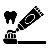 Perfect design solid icon of toothpaste with brush vector