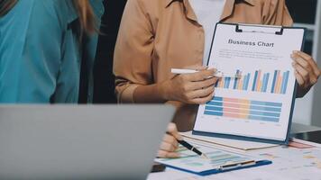 Business chart with graphs on a clipboard video