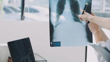A person is looking at an x - ray on a computer screen video