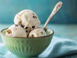 Delightful scoops of vanilla ice cream with chocolate chips, cool and creamy treat photo