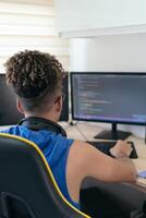 Computer programmer busy coding in his studio photo
