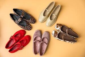 Stylish ballet flats in various colors and textures arranged in a circular pattern photo