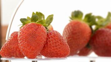 Strawberries rotating in loop, composition video