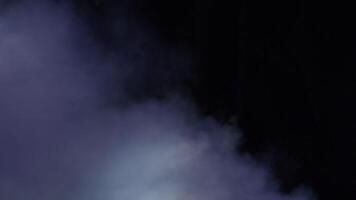 Smoke fog passing with strobe lights stage beating at black background video