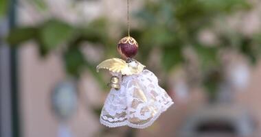 Explore delightful Easter home decor featuring enchanting handcrafted decorations. This lively display showcases an adorable Easter angel, adding a charming touch to your festive celebration. video