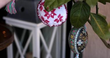 Learn how to craft a beautiful Easter tree using handmade decorations. This tutorial showcases vibrant colors and designs that will enhance your Easter decor and celebrate the season. video