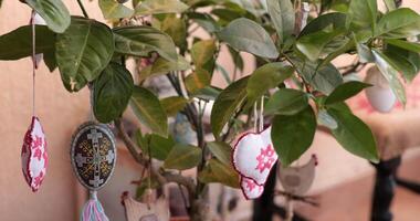 Explore the joy of setting up an Easter tree filled with vibrant handcrafted decorations. Experience the charm of homemade crafts that enhance your Easter decor and make your space festive. video