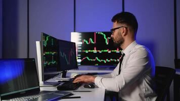 Crypto trader analyzing market charts for investment decisions video
