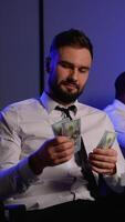 Successful trader counting profits from stock market investment video