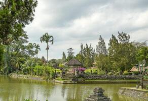 A moat around the Beautiful Garden Temple on Bali photo