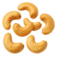 Isolated arrangement of several cashew nuts presented against a solid colored plain backdrop transparent background png