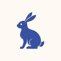 A blue rabbit is sitting on a white background vector