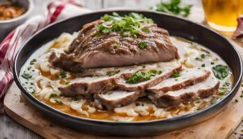 Pork shoulder in honey parmesan and soy souse, prepared in slow cooker or crockpot, on a wooden board, horizontal photo