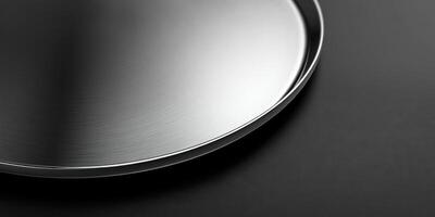 Minimalist shiny metal surface plate on dark background concept photo