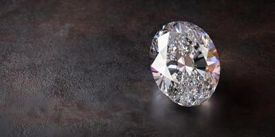 Sparkling diamond gemstone on dark stone surface reflecting light and clarity photo