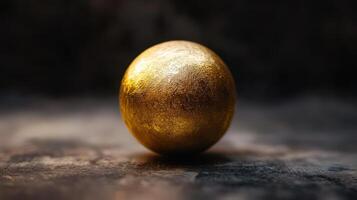 Shiny golden sphere on abstract surface illustrating elegance and simplicity photo
