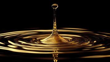Golden liquid drop creating ripple effect on a glossy surface captured in mid-air photo