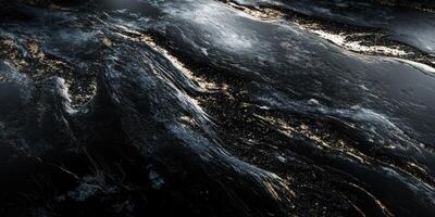 Abstract aesthetic of dark liquid marble with gold accents and flowing texture photo