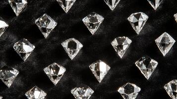 Sparkling diamonds arranged on black velvet display for jewelry concept and elegance photo
