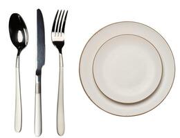 Empty white plate and cutlery on isolated background, top view photo