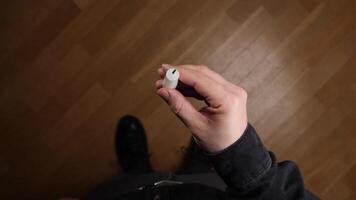 pov Man holding extinguished candle in hand, first-person view video