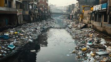 A polluted waterway filled with trash, highlighting environmental degradation. photo