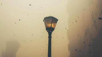 A streetlamp shines through a foggy atmosphere, surrounded by swirling debris. photo