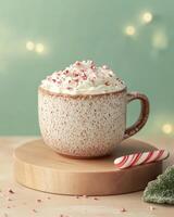 A cozy cup of peppermint hot chocolate topped with whipped cream and festive sprinkles. photo