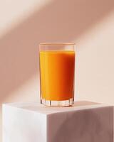 A glass of vibrant orange juice on a marble pedestal against a soft background. photo