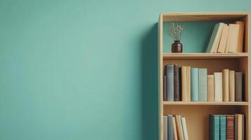 A wooden bookshelf filled with books against a teal wall, creating a cozy reading space. photo