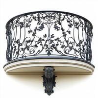 Ornate wrought iron balcony railing with floral patterns and decorative support. photo