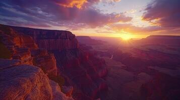 A stunning sunset view over the Grand Canyon, highlighting its majestic rock formations. photo