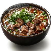 Steaming Bowl of Beef Noodle Soup with Cilantro Garnish photo