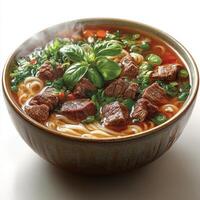 Bowl of Steaming Beef Noodle Soup with Basil Garnish photo