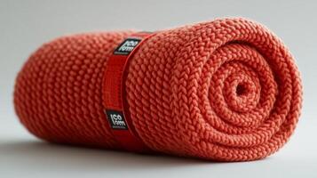 Rolled Coral Knit Blanket with Black Label photo