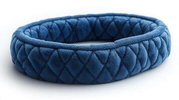 Blue Quilted Fabric Ring on White Background photo