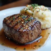 Grilled Steak with Mashed Potatoes and Herbs photo