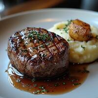 Grilled Steak with Mashed Potatoes and Roasted Garlic photo