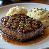 Grilled Steak with Mashed Potatoes and Gravy photo