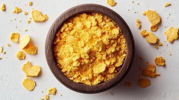 Dried Egg Yolk Flakes in Wooden Bowl photo