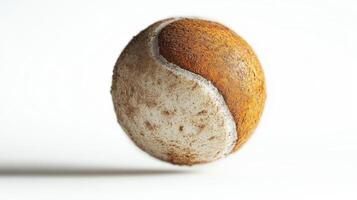 A Tennis Ball Covered in Dirt photo
