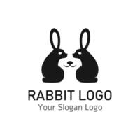 two rabbits silhouette logo with face in the middle vector
