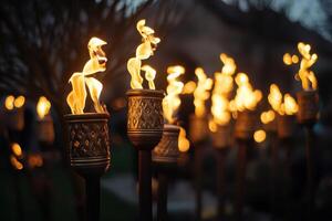 A row of torches lit up with flames photo
