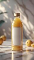 Golden juice bottle with blank label, showcasing natural light and sophisticated design. Refined presentation, healthy refreshment concept. photo