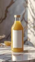 Elegant fruit juice in a glass bottle. Delicious and refreshing, perfect for a healthy start to the day with the blank label. photo