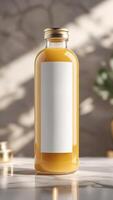 Elevated presentation of a bottled golden beverage, featuring a sleek design and a white label on a marble surface, reflecting elegance. photo