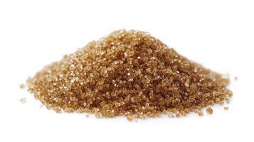 Light Brown Sugar Granules Pile On White Backgrounds photo