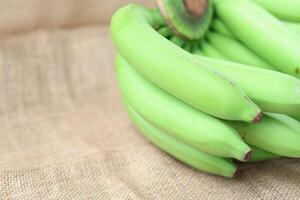 Side view of Bunch raw and green banana. Cavendish banana. copy space photo