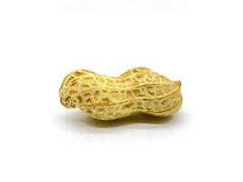 A peanut still inside their shell, beautifully arranged on a white background for a clean and simple presentation photo